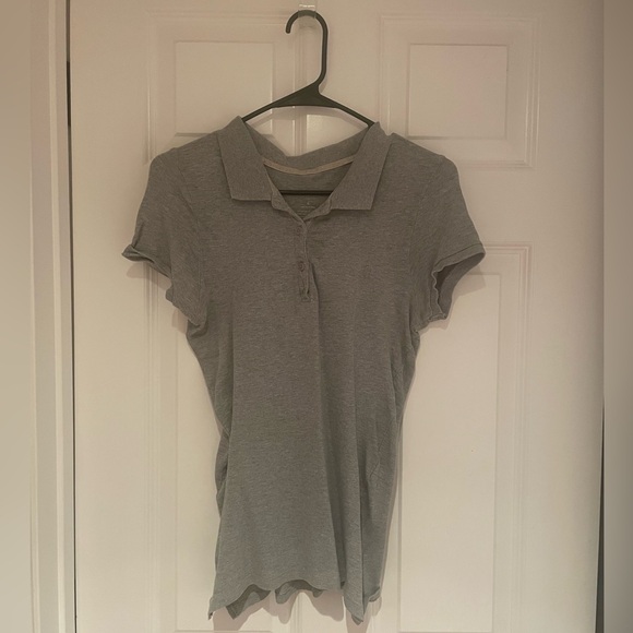 Tops - Women's polo shirt. Size Medium.